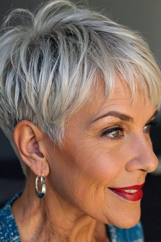 Textured silver-white pixie haircut, side view