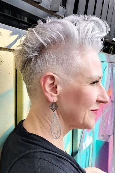 Edgy spiky white pixie haircut, side view