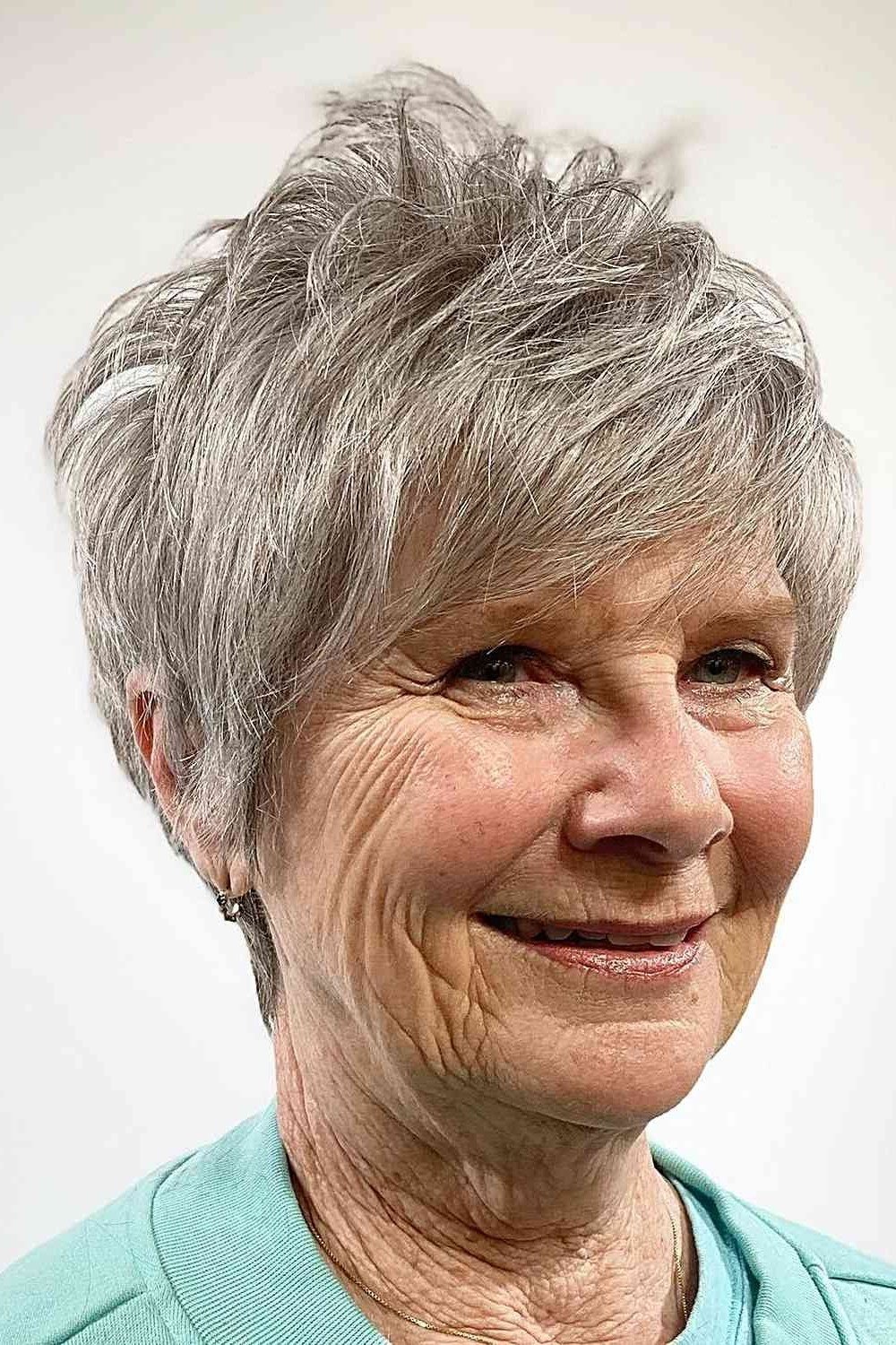 Gray Textured Pixie with a Happy Finish on a woman over 70