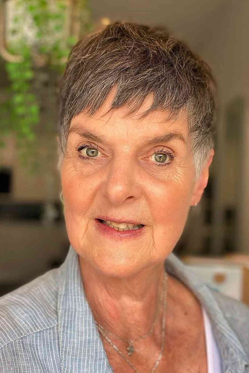 Gray Pixie with Soft Side Sweep on a woman over 70
