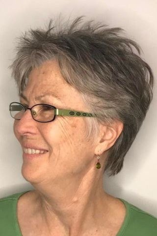 Gray Spiky Pixie with a Confident Edge on a woman over 70
