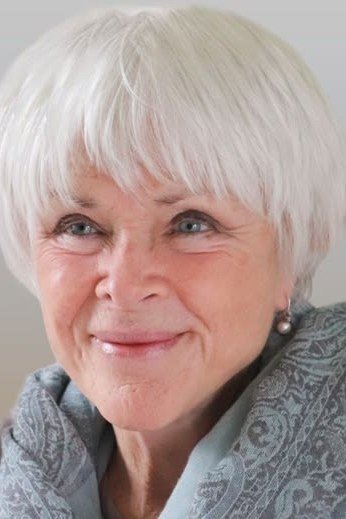 White Pixie with Wispy Bangs on a woman over 70