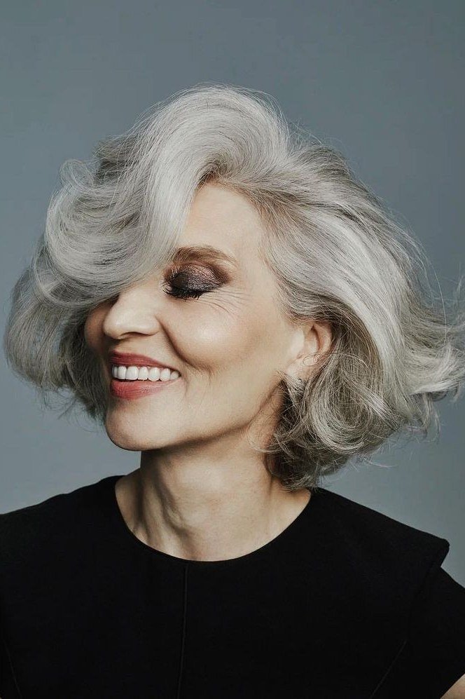 Voluminous Gray Wavy Bob on a woman over 70