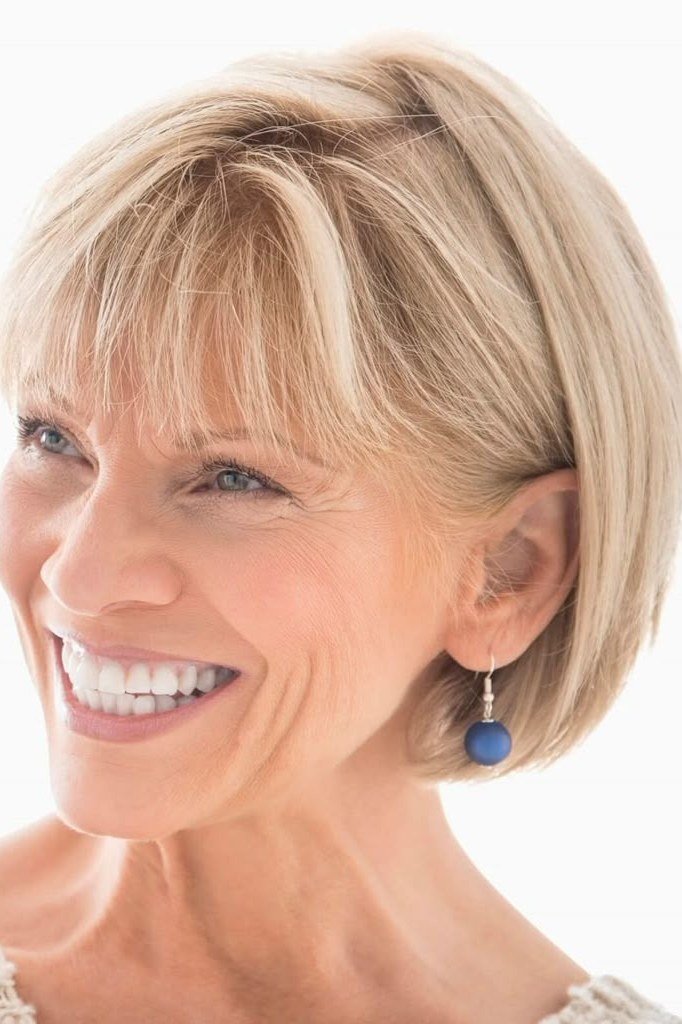 Blonde Bob with Side-Swept Bangs on a woman over 70