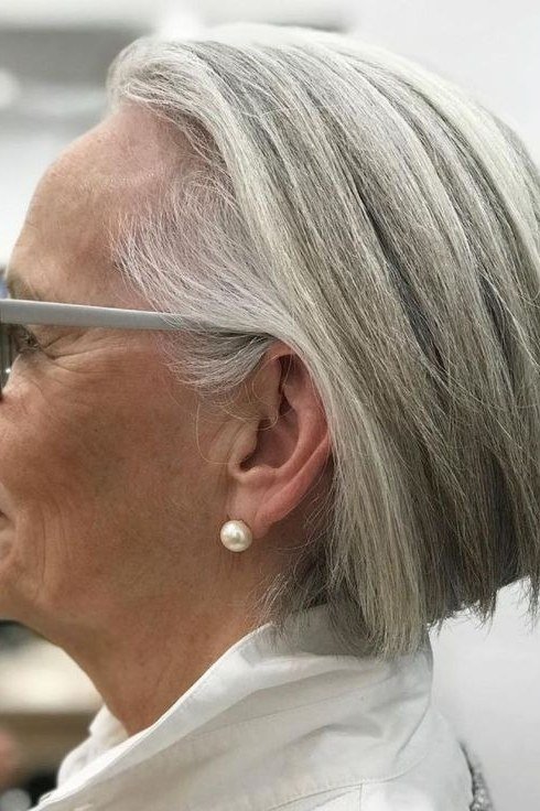 Gray Bob with a Pearl Earring on a woman over 70