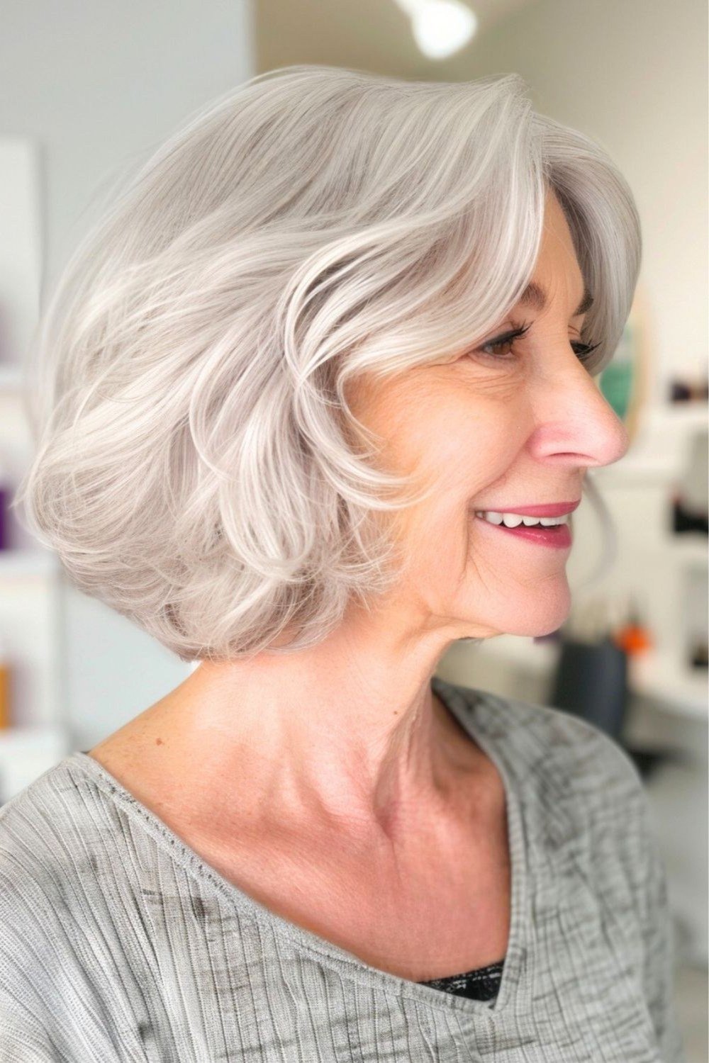 White Wavy Bob with a Gentle Smile on a woman over 70