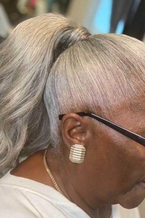 Gray Ponytail with Easy Elegance on a woman over 70