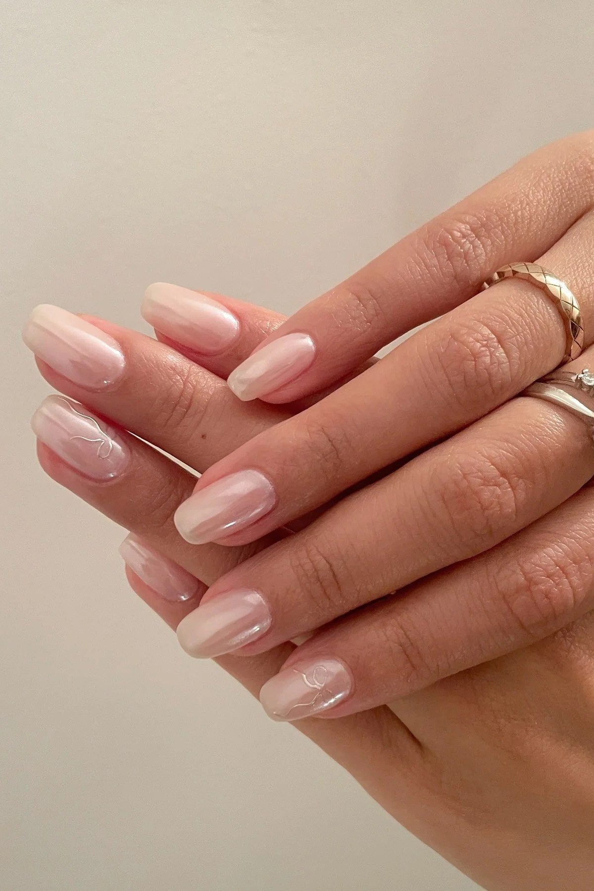 Pale Pink Glossy Almond Nails - simple nail design for women over 60