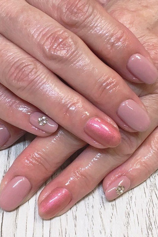 Soft Pink Nails with Crystal Accents - simple nail design for women over 60