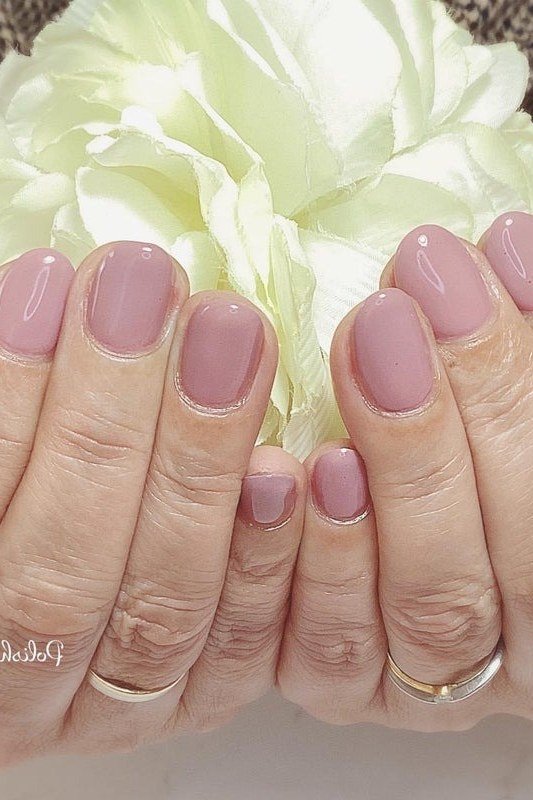 Mauve Nails with White Floral Accents - simple nail design for women over 60