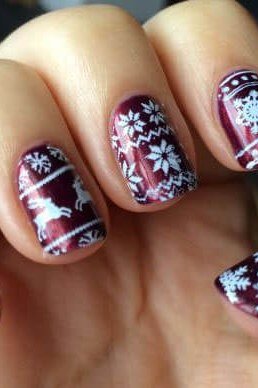Purple nails with white snowflake nail art, cheerful winter manicure for short nails