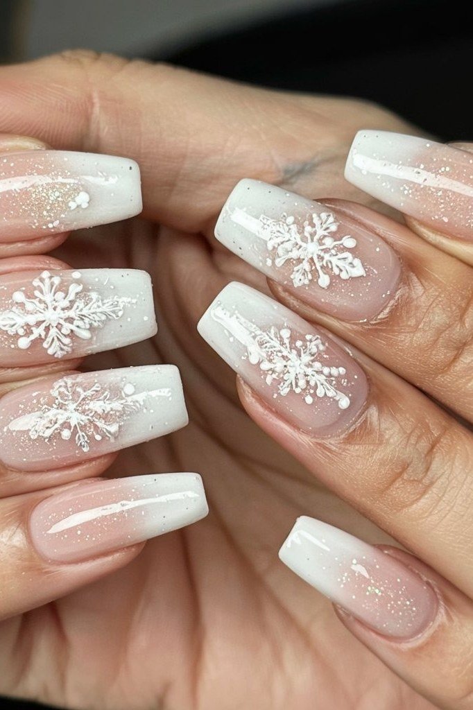 White ombre nails with delicate snowflakes, soft dreamy winter manicure design