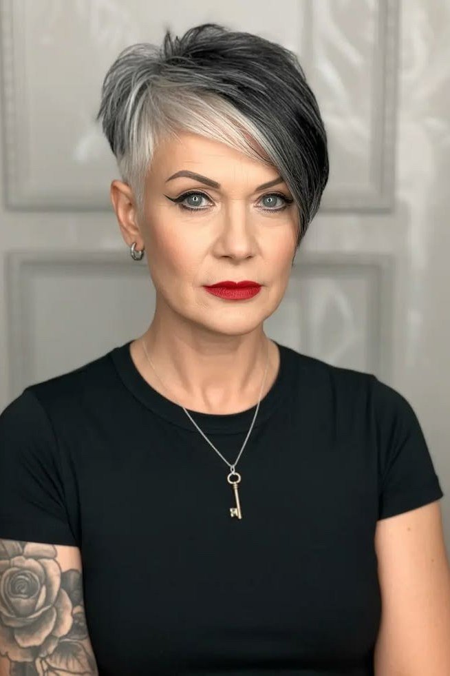 Silver pixie cut with dark roots and spiky texture for women over 60