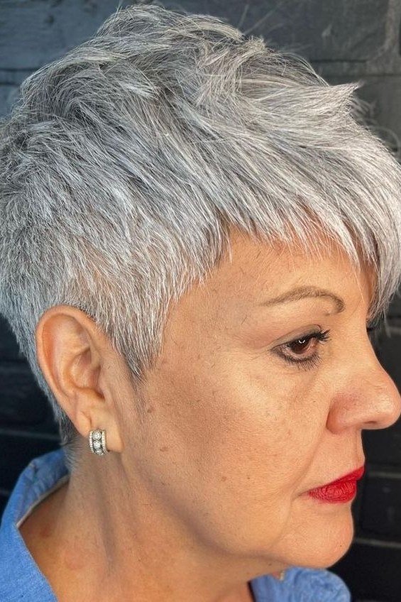Sleek silver spiky pixie cut for women over 60