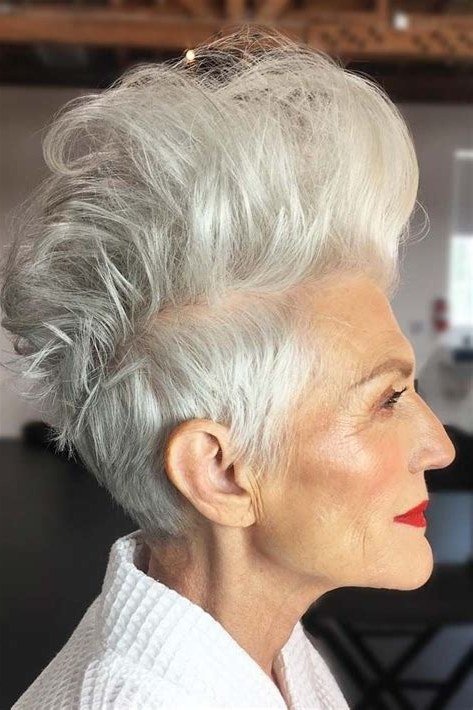 Voluminous tall white spiky pixie cut for women over 60