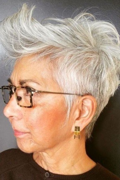 Tall white spiky pixie haircut for older women with glasses
