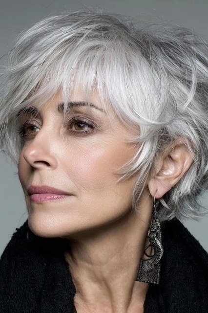 Tousled silver spiky pixie haircut for older women