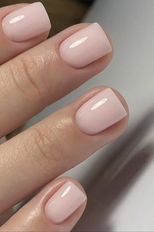 Sheer Nude-Pink Squoval Nails - simple pink nail idea for women over 50