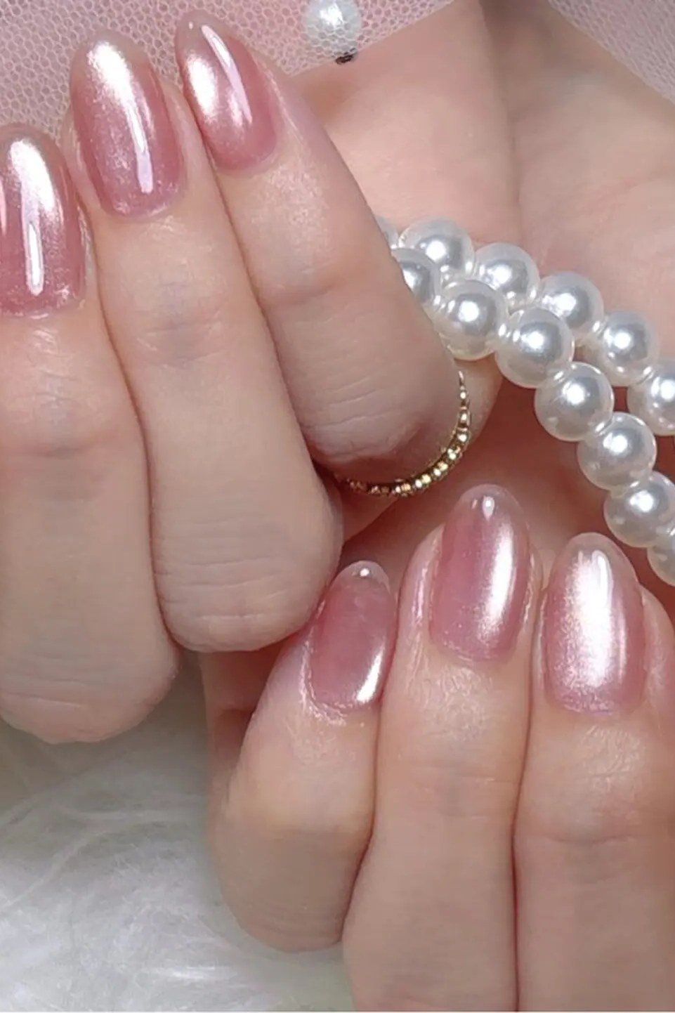 Pink Chrome Glaze Almonds - simple pink nail idea for women over 50