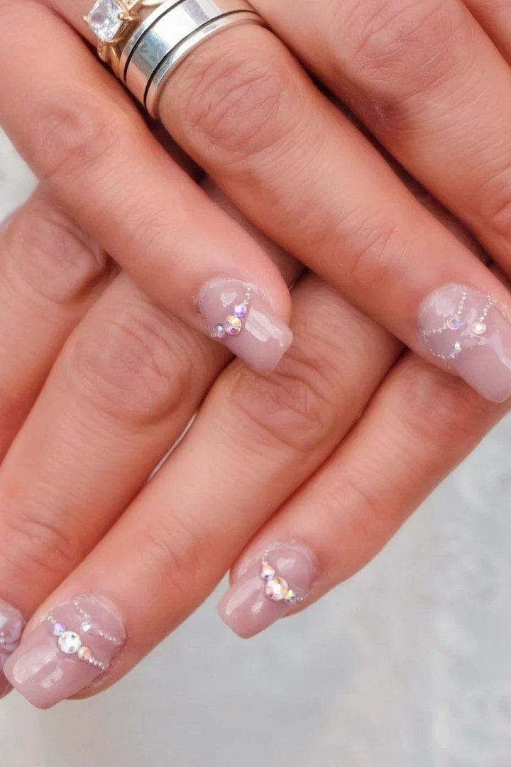 Pink French Tips With Floral Art - simple pink nail idea for women over 50