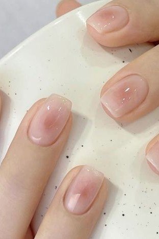 Sheer Nude Pink, Coffee-Cup Pose - simple pink nail idea for women over 50