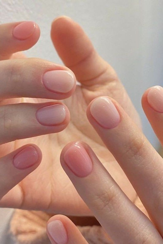 Sheer Pink Short Round Nails - simple pink nail idea for women over 50