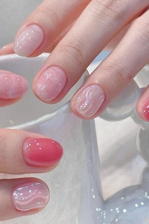 Pink Glitter Accent Nails - simple pink nail idea for women over 50