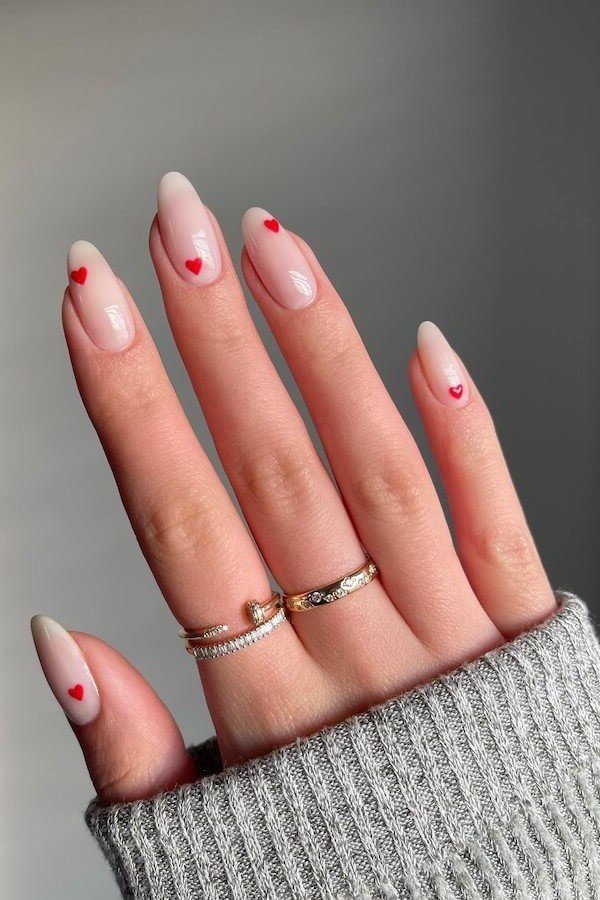 Pink Heart French Tips - simple pink nail idea for women over 50
