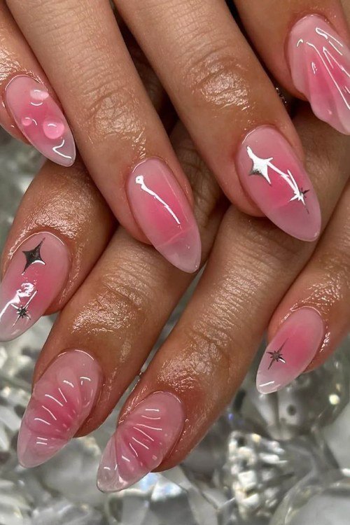 Pink Gradient Almonds With Star Art - simple pink nail idea for women over 50