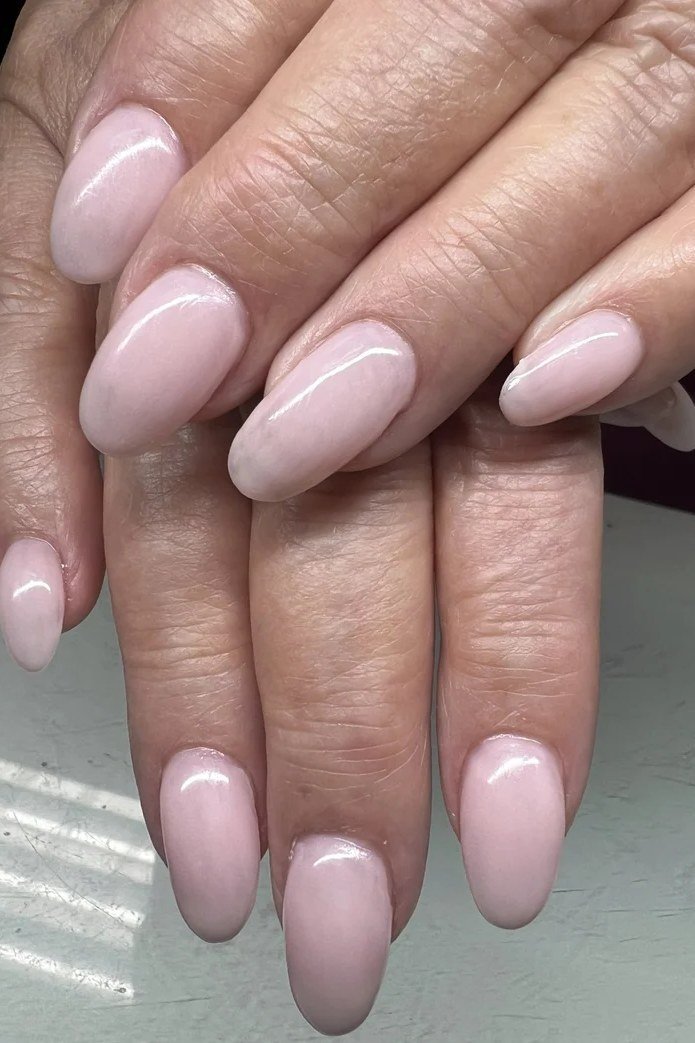 Pale Pink Almonds on Mature Hands - simple pink nail idea for women over 50