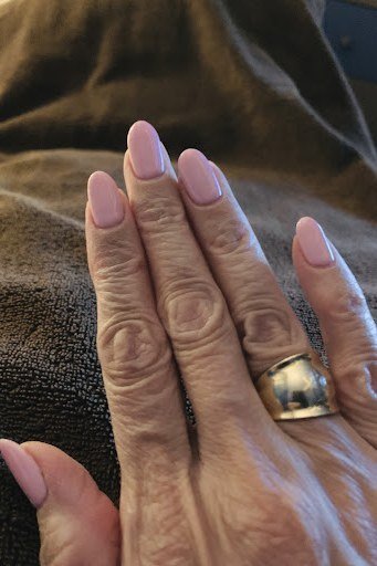 Dusty Rose Squovals With a Ring - simple pink nail idea for women over 50