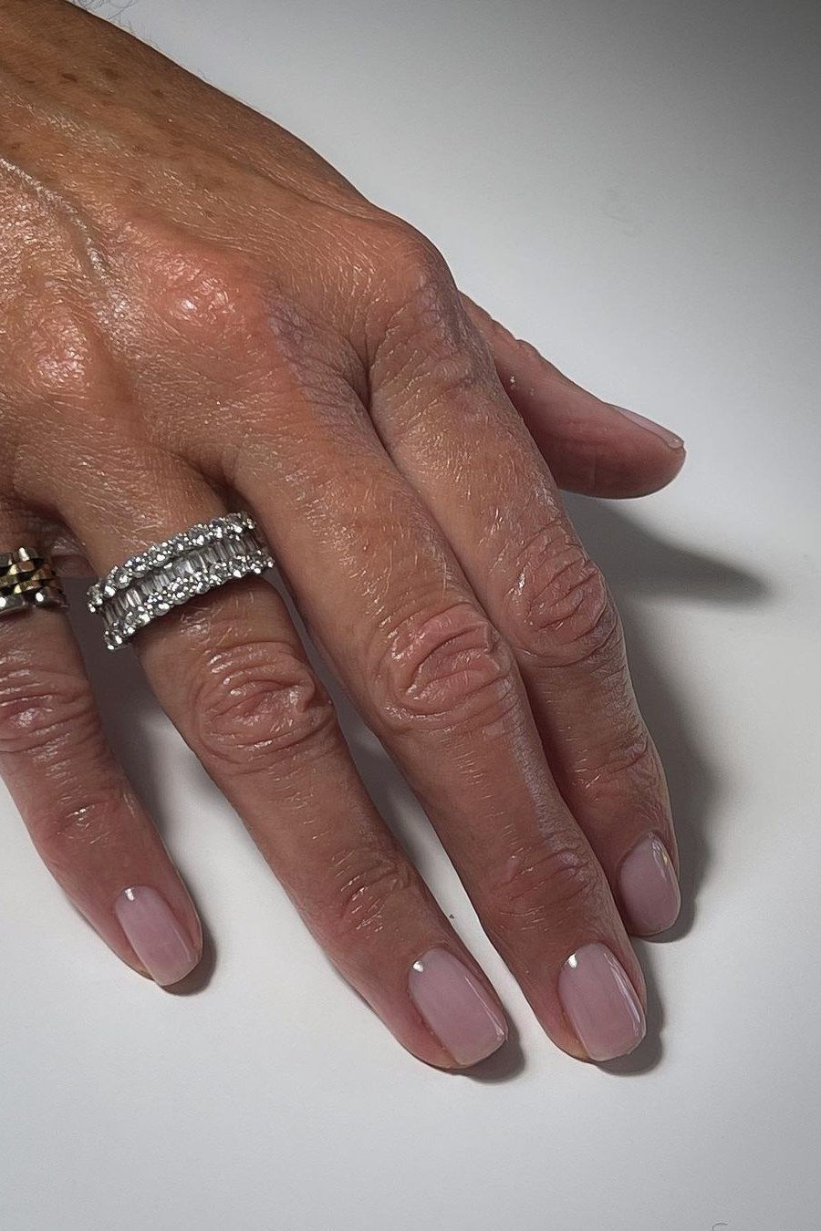 Mauve-Pink on Deep Skin - simple pink nail idea for women over 50
