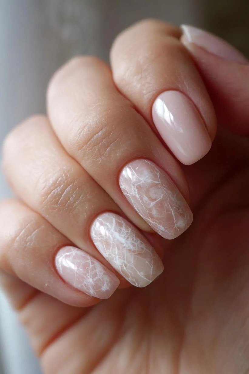 White Floral Art on Pink - simple pink nail idea for women over 50