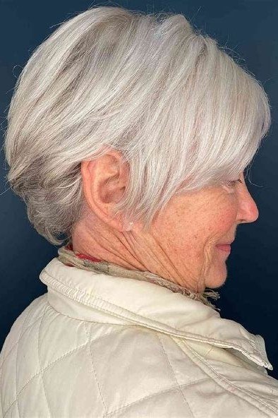 White Layered Pixie-Bob - simple stylish hairstyle for women over 70 (white layered pixie-bob, side view)