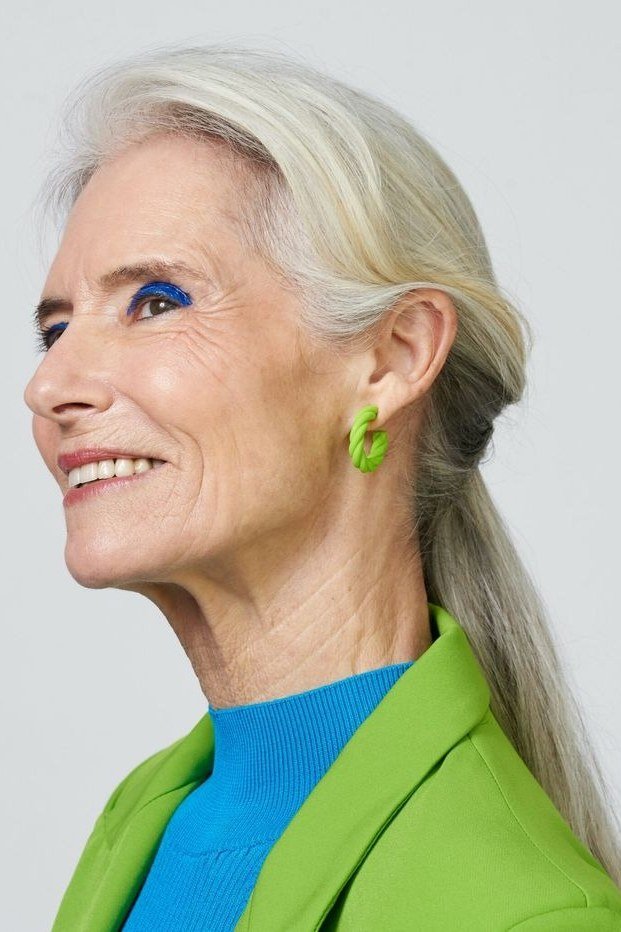 White Sleek Ponytail - simple stylish hairstyle for women over 70 (white sleek ponytail, side view)