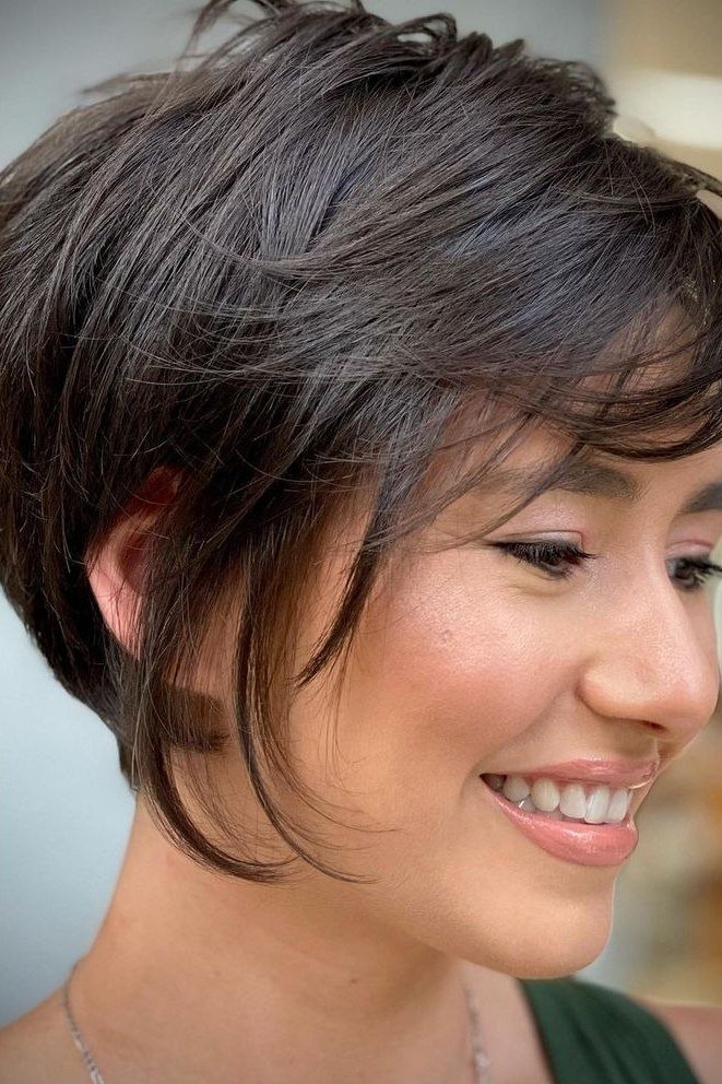 Dark brown pixie bob with volume for women over 60, three-quarter view