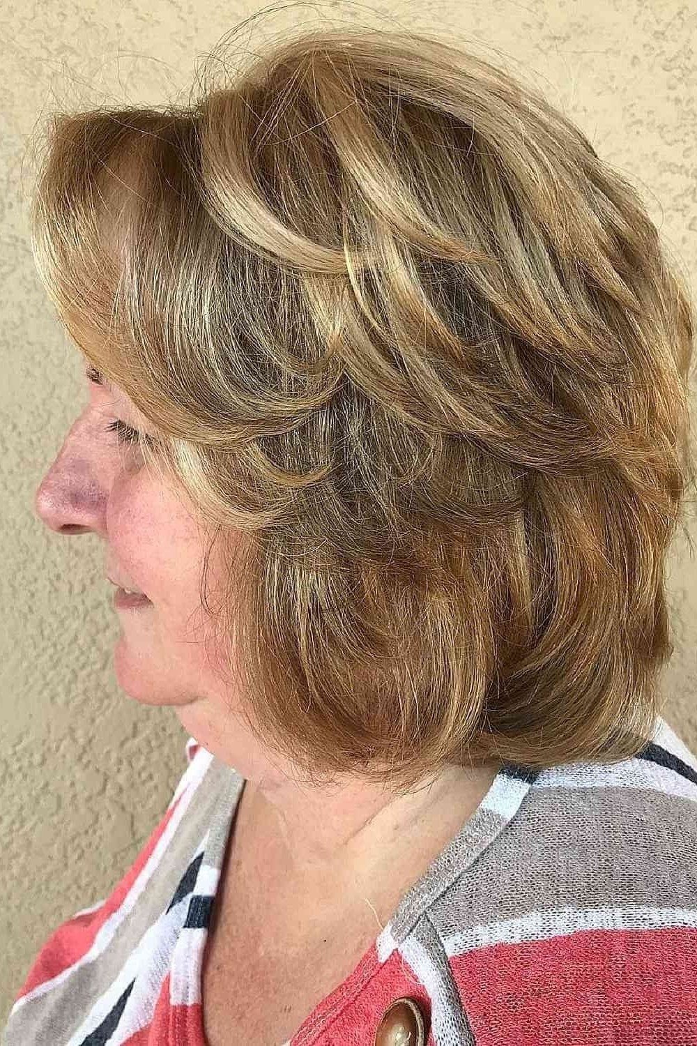 Warm brown stacked bob haircut for women over 60, side view