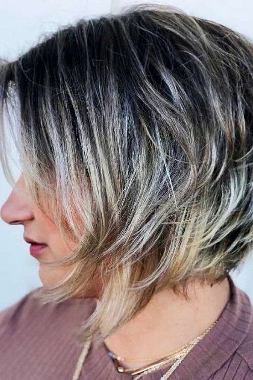 Black to silver ombre bob haircut for women over 60, side view