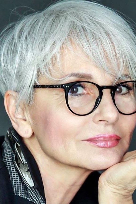 Silver-white textured pixie-bob with glasses - inverted bob haircut for women over 60
