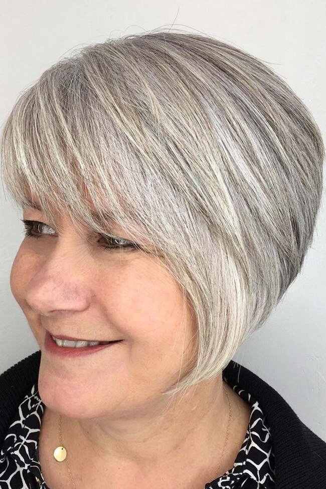 White sleek angled bob, three-quarter front - inverted bob haircut for women over 60