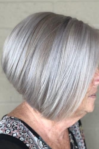 Silver-grey angled side profile - inverted bob haircut for women over 60