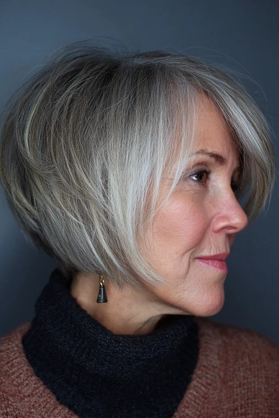 Silver angled bob, side, turtleneck - inverted bob haircut for women over 60