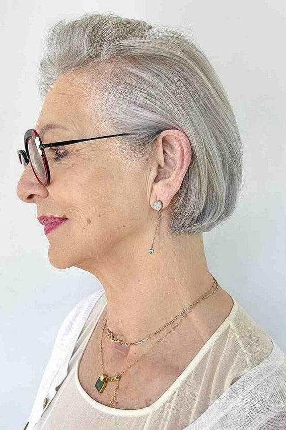 Grey sleek bob with glasses, side - inverted bob haircut for women over 60