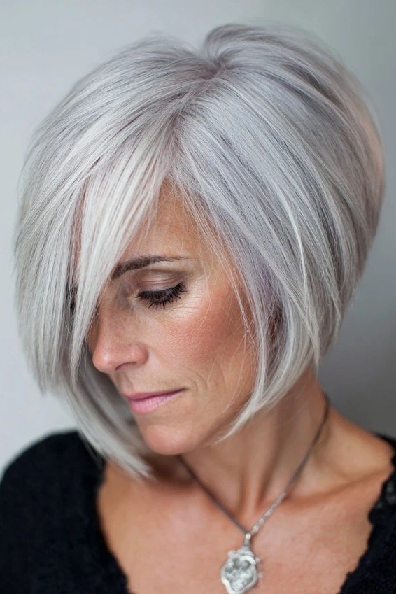 Sandy blonde angled bob, side - inverted bob haircut for women over 60