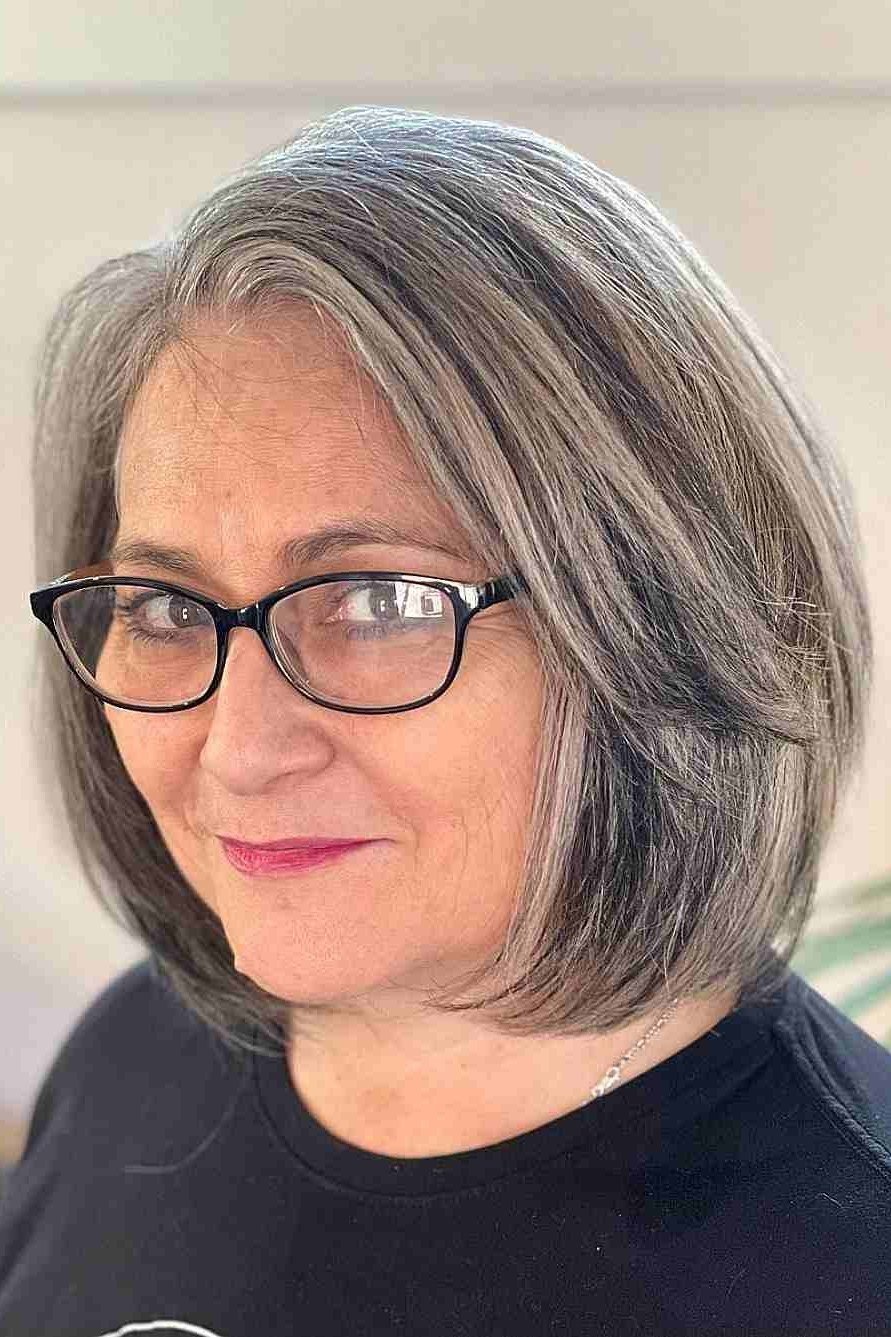 Grey sleek bob with glasses, front - inverted bob haircut for women over 60