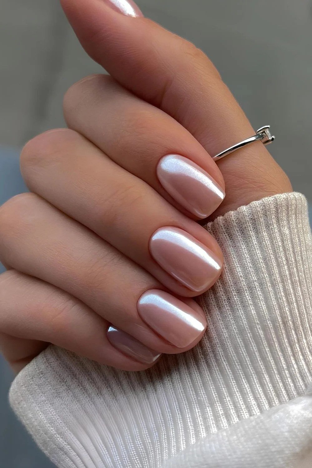 Pink chrome glazed donut nails with pearly shine, trendy summer chrome nails