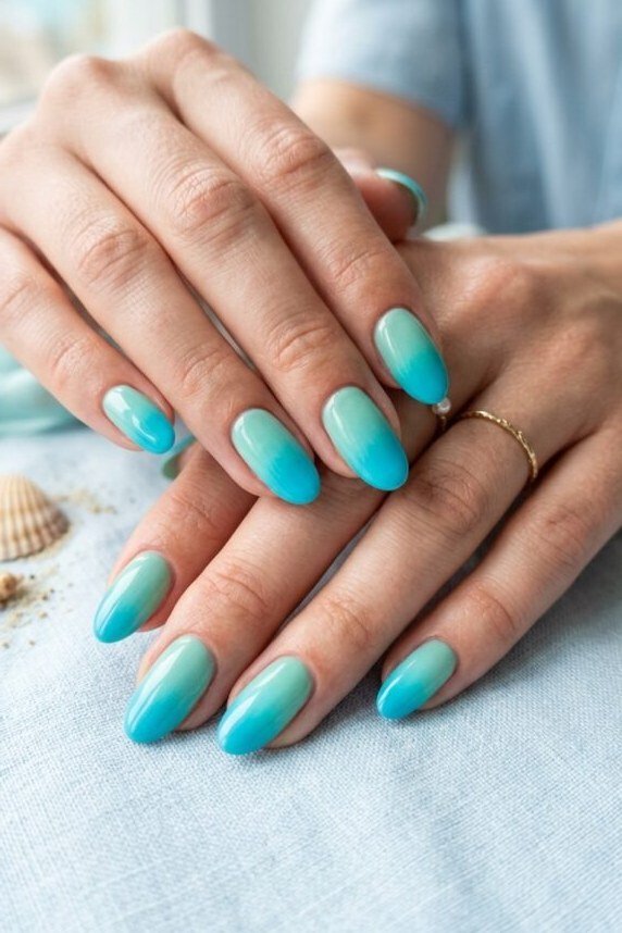 White to turquoise ombre almond nails, beachy gradient summer nails for women over 40