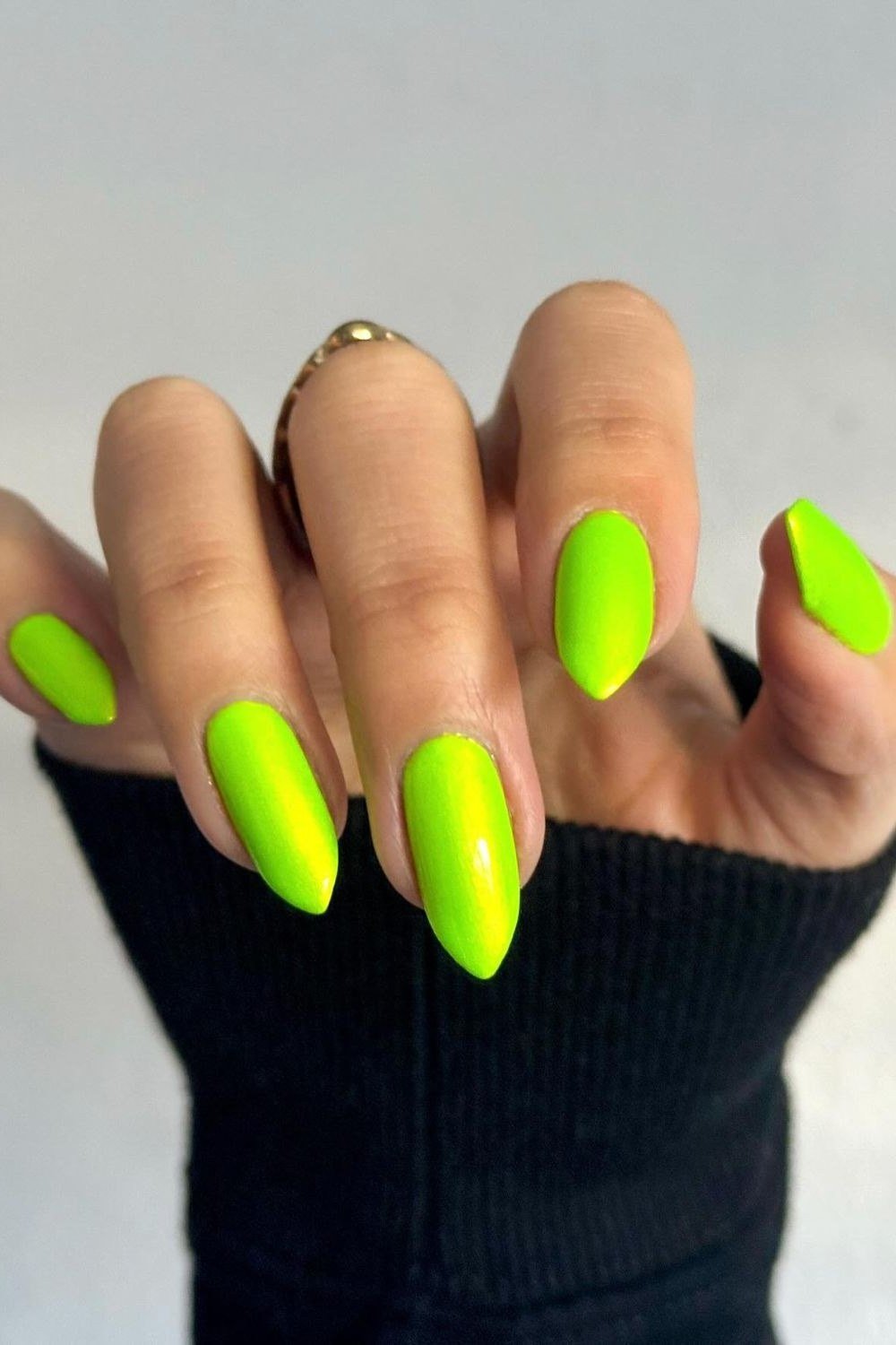 Neon lime green almond nails with glossy finish, electric summer neon nails