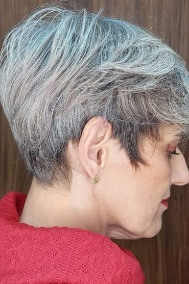 Silver gray tapered pixie for women over 60 with red top, side view