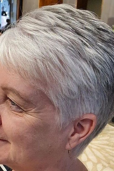 Salon fresh silver pixie haircut for women over 60, closeup
